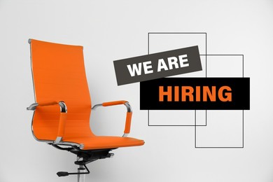 Image of Orange office chair and text WE`RE HIRING on white background