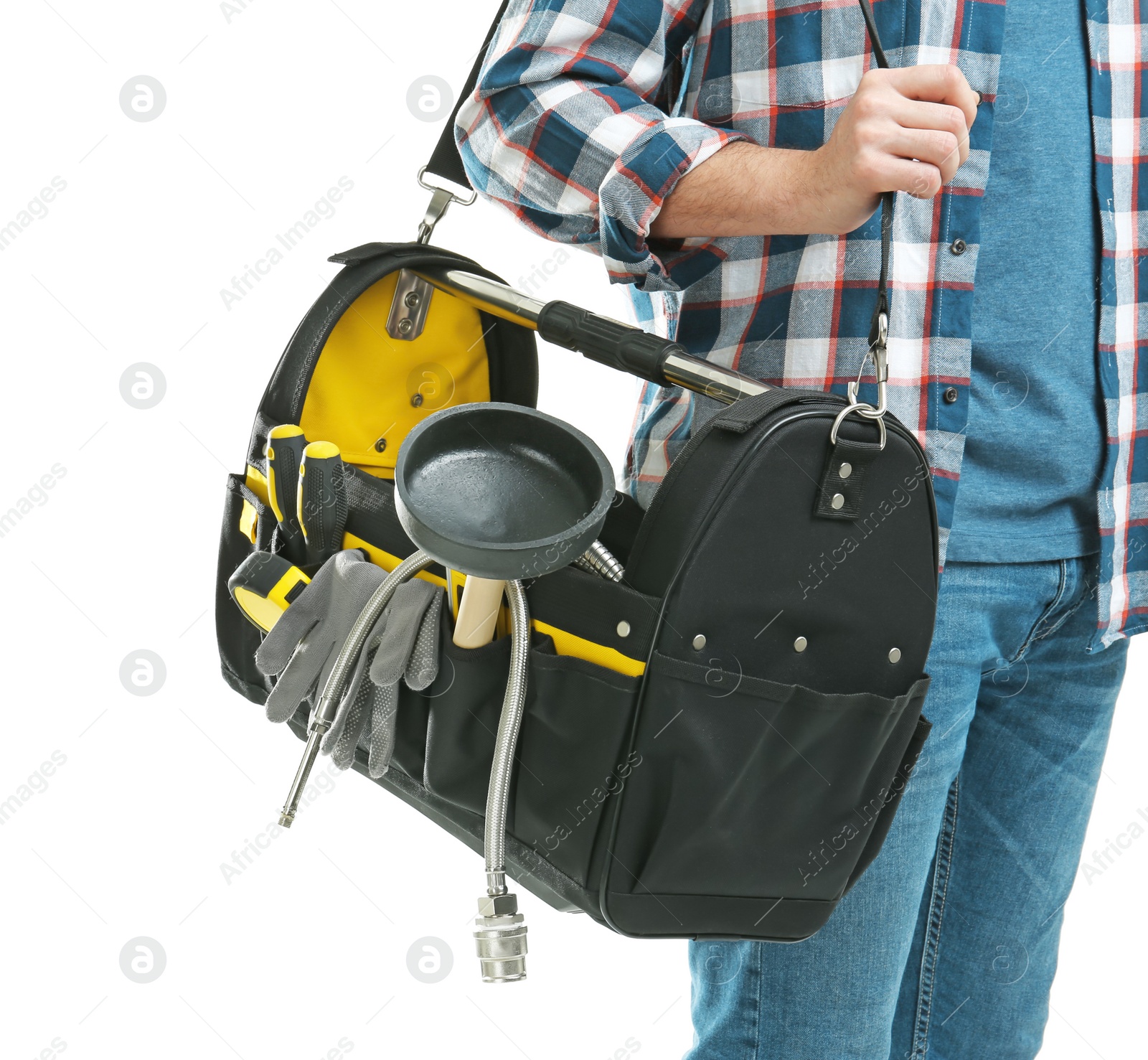 Photo of Young plumber with tool bag on white background, closeup