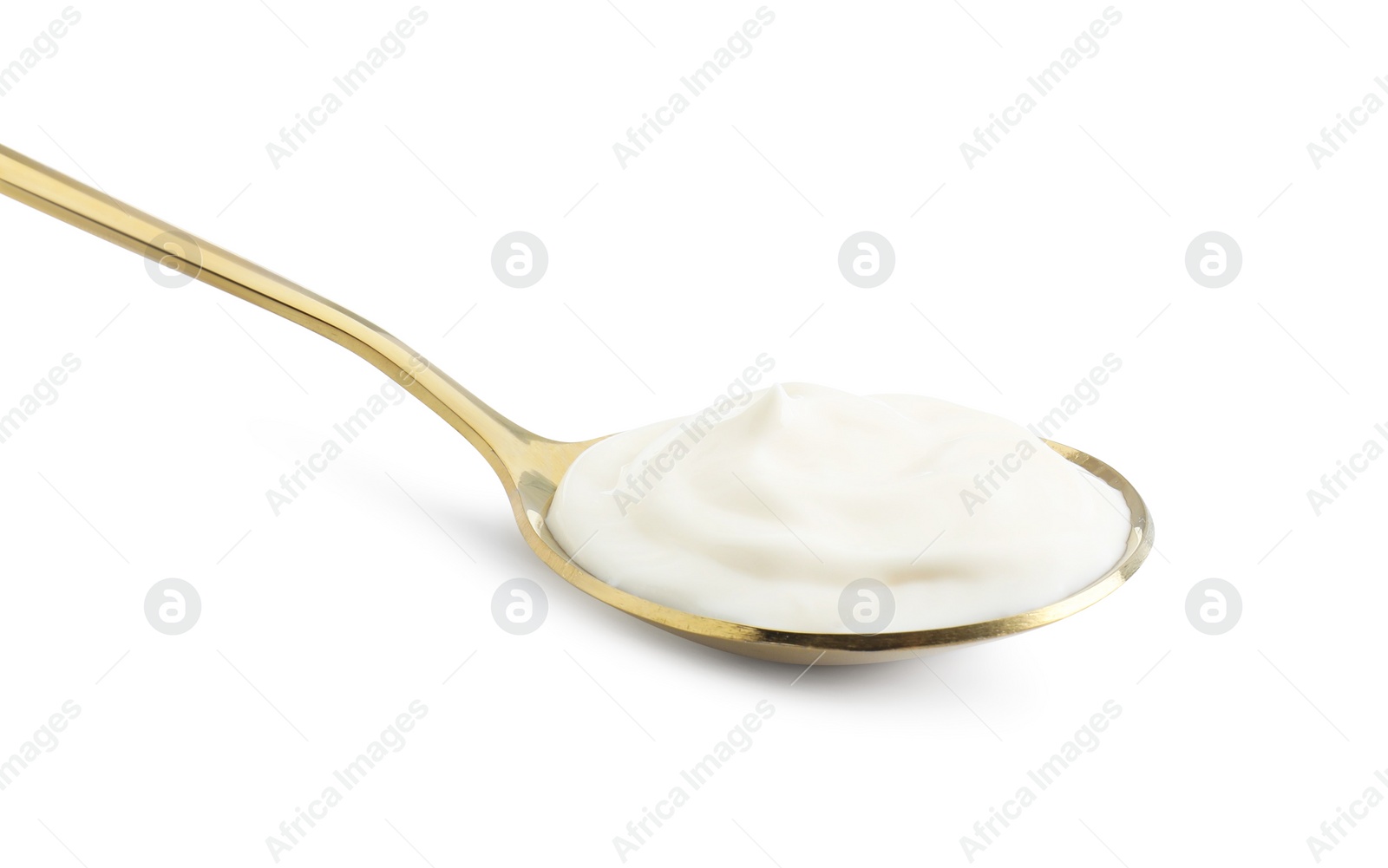 One golden spoon with mayonnaise isolated on white Photo of One golden spoon with mayonnaise isolated on white