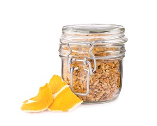 Photo of Jar of dried orange zest seasoning and fresh peel isolated on white