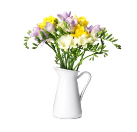 Photo of Bouquet of fresh freesia flowers in jug isolated on white
