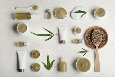 Photo of Flat lay composition with hemp lotion on white wooden background