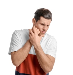 Photo of Young man suffering from toothache on white background