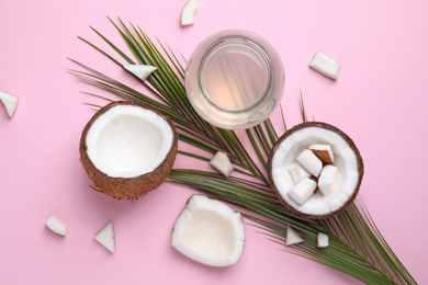 Photo of Flat lay composition with coconut oil on pink background