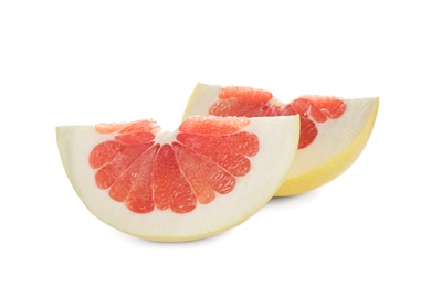 Photo of Slices of red pomelo isolated on white