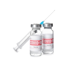 Photo of Vials with vaccine against coronavirus and syringe on white background