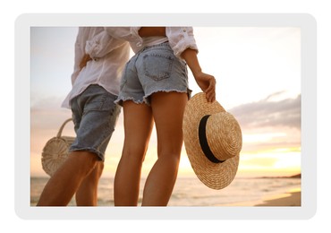 Image of Paper photo. Lovely couple walking on beach at sunset, closeup