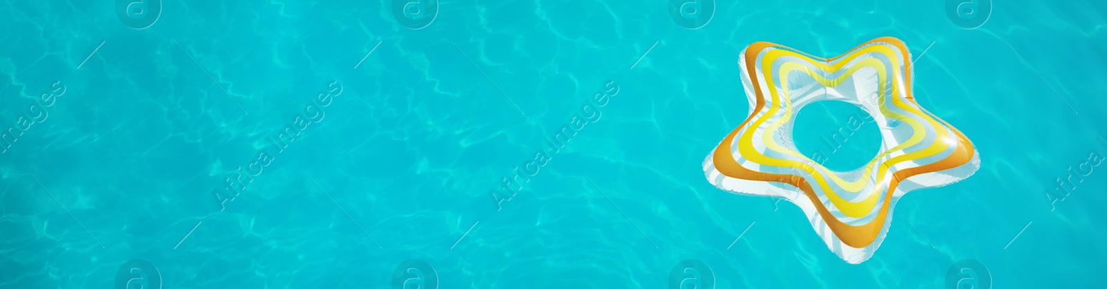 Image of Star shaped inflatable ring floating in swimming pool on sunny day, above view, space for text. Banner design