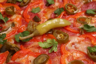 Photo of Delicious hot pizza Diablo as background, closeup