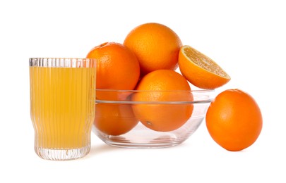 Photo of Fresh oranges in bowl and glass of juice isolated on white