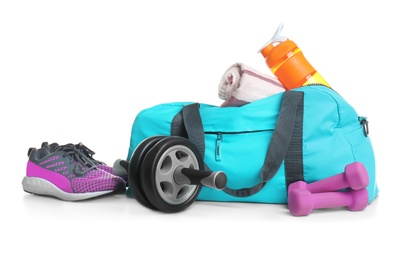 Photo of Sports bag and gym stuff on white background