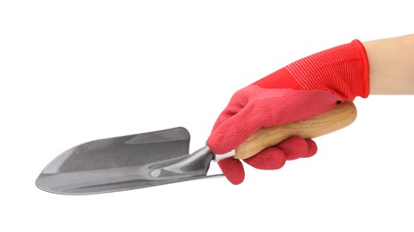 Woman in gardening glove holding trowel on white background, closeup