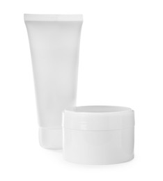 Tube and jar of hand cream isolated on white