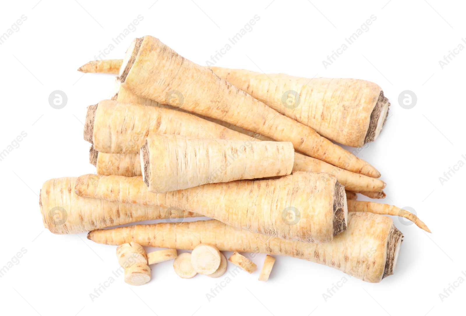 Photo of Raw parsley roots isolated on white, top view