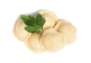 Photo of Boiled dumplings with parsley on white background, top view