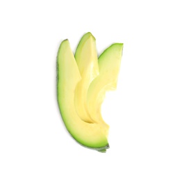 Slices of avocado on white background