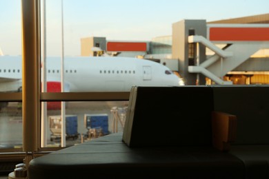 Photo of Interior of modern airport terminal. Air travel