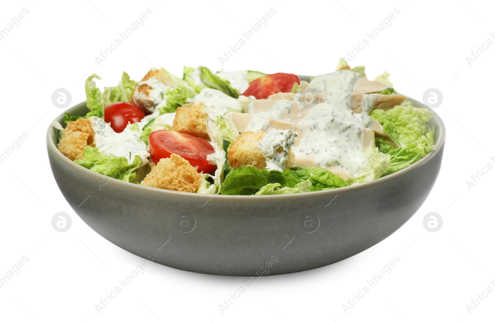 Photo of Bowl of delicious salad with Chinese cabbage, cucumber, meat and tomatoes isolated on white