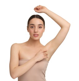 Beautiful woman showing armpit with smooth clean skin on white background