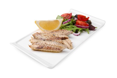 Photo of Plate with delicious canned mackerel fillets, lemon and salad on white background, closeup