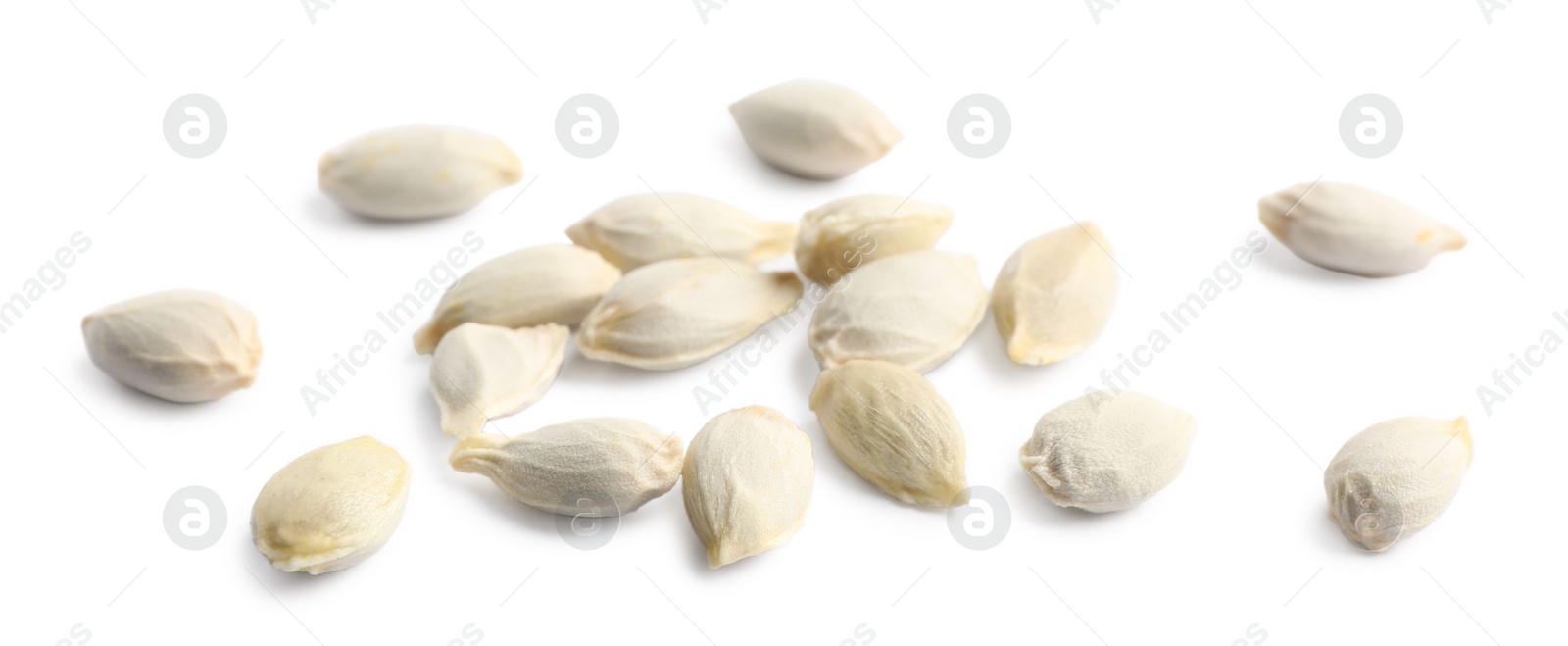 Photo of Many seeds of tangerine isolated on white