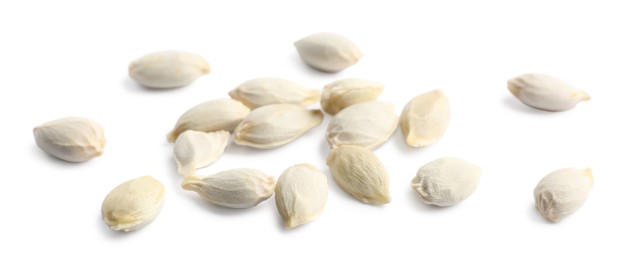 Photo of Many seeds of tangerine isolated on white