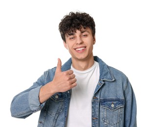 Photo of Handsome young man showing thumb up on white background