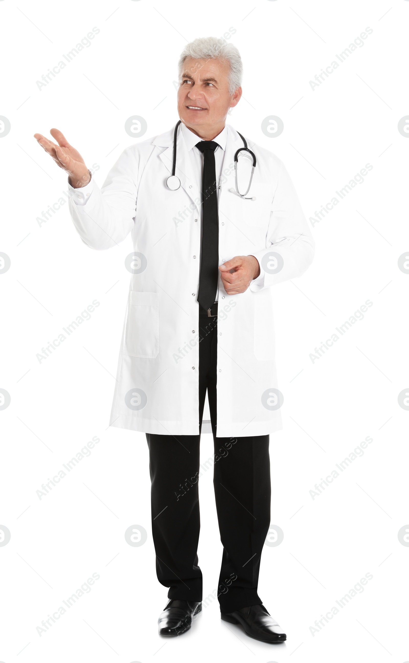 Photo of Full length portrait of male doctor with stethoscope isolated on white. Medical staff