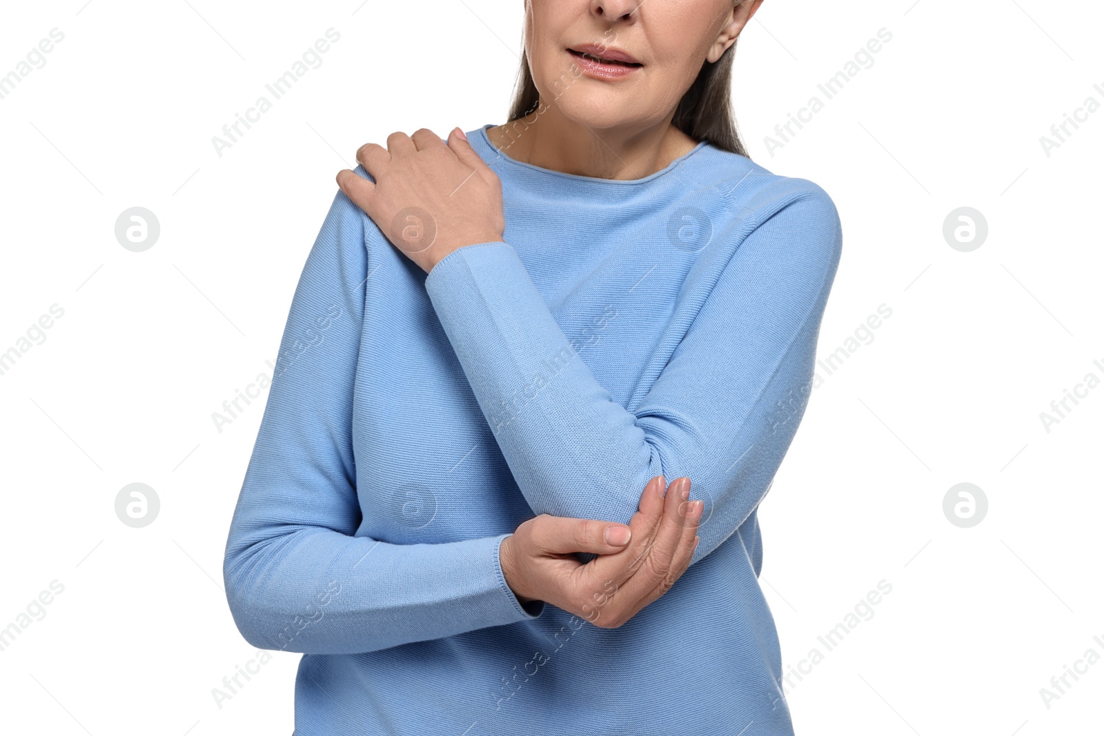 Photo of Arthritis symptoms. Woman suffering from pain in elbow on white background, closeup