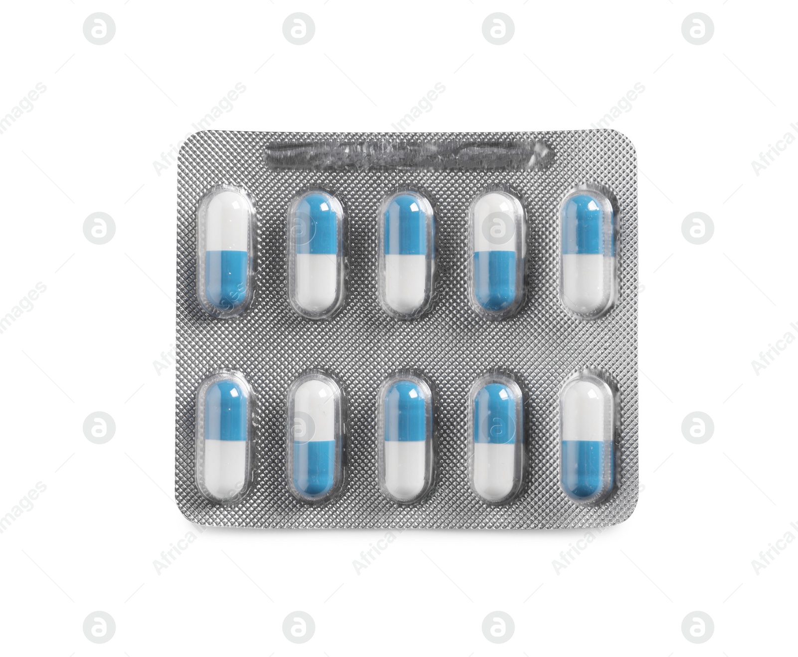 Photo of Blister of pills on white background, top view