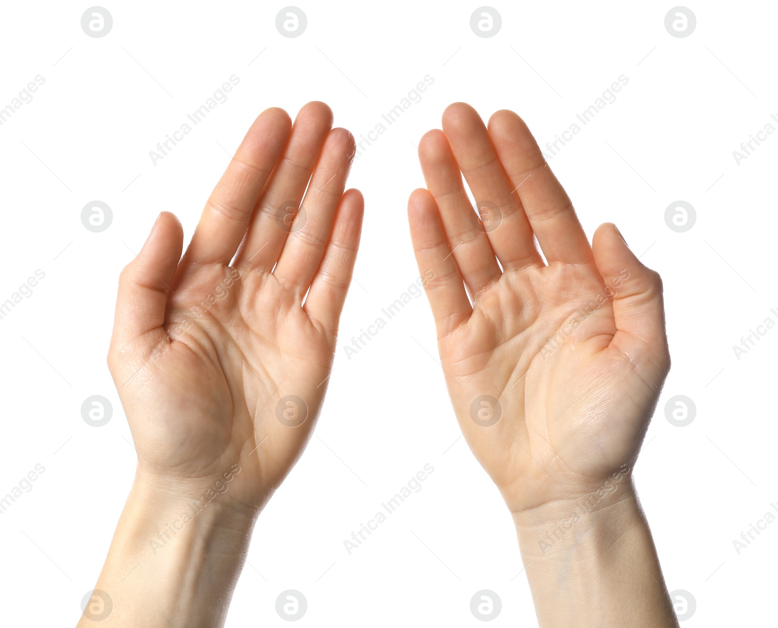 Photo of Religion. Woman with open palms praying on white background, closeup