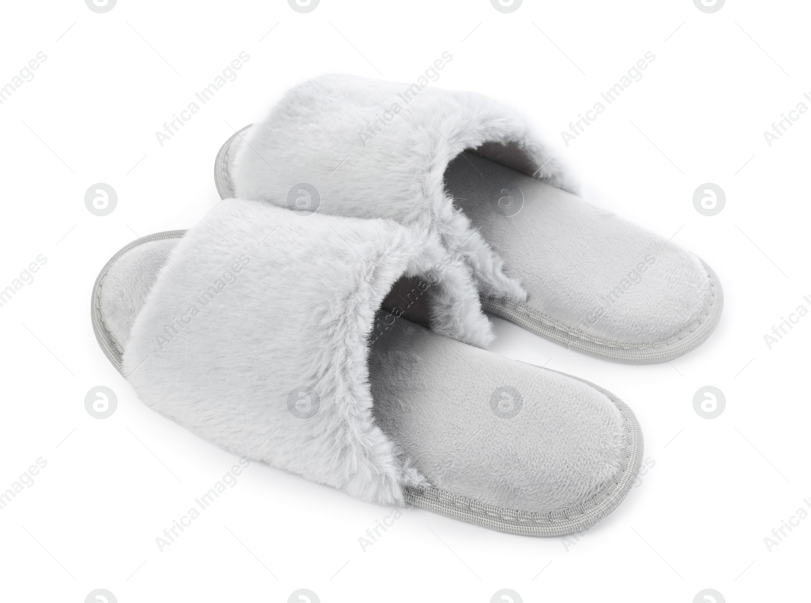 Photo of Pair of soft slippers with fur isolated on white