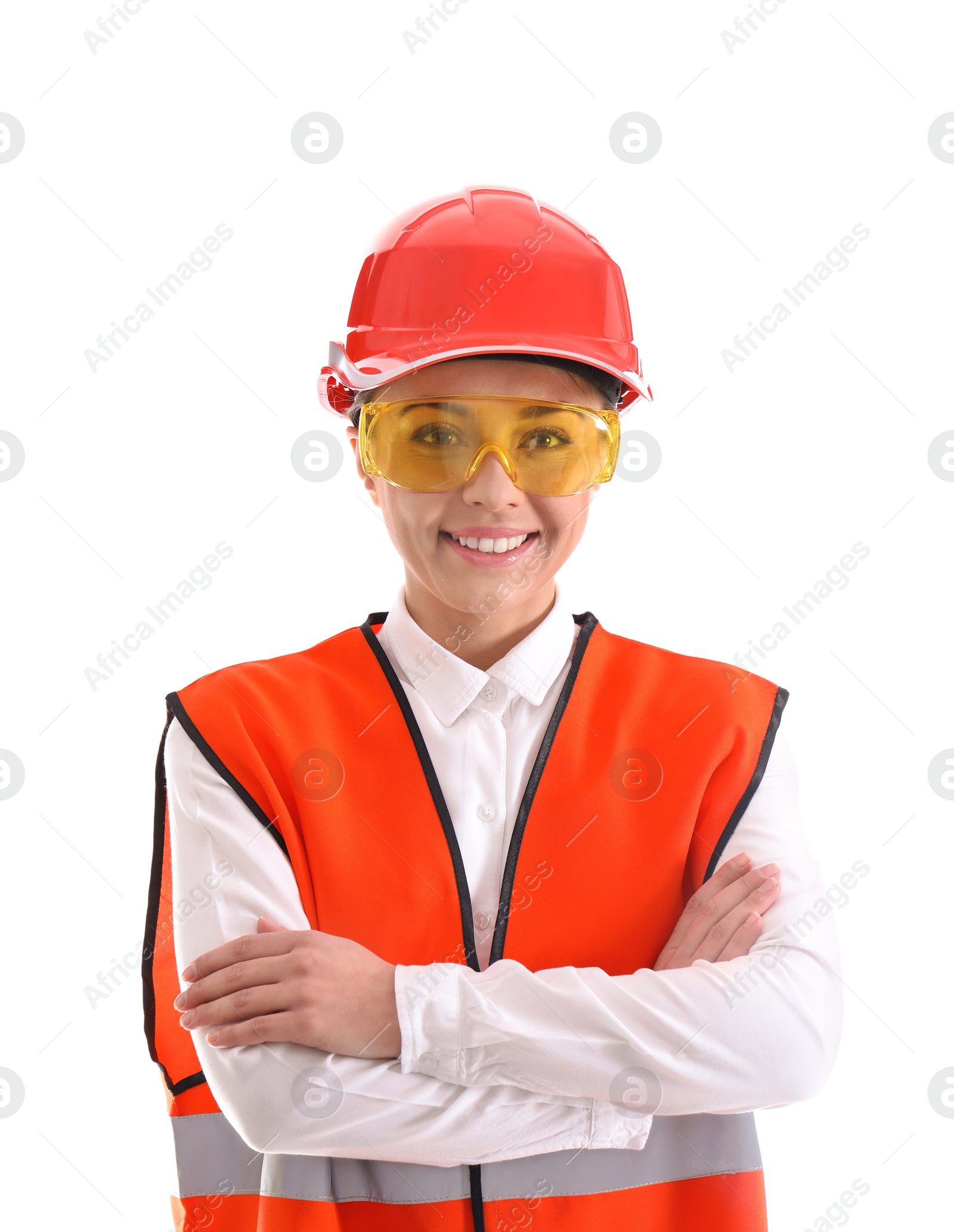 Photo of Female industrial engineer in uniform on white background. Safety equipment