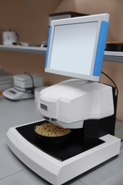 Photo of Multipurpose infrared analyzer for grain samples in modern laboratory