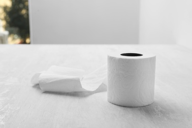 Photo of Soft toilet paper roll on light table