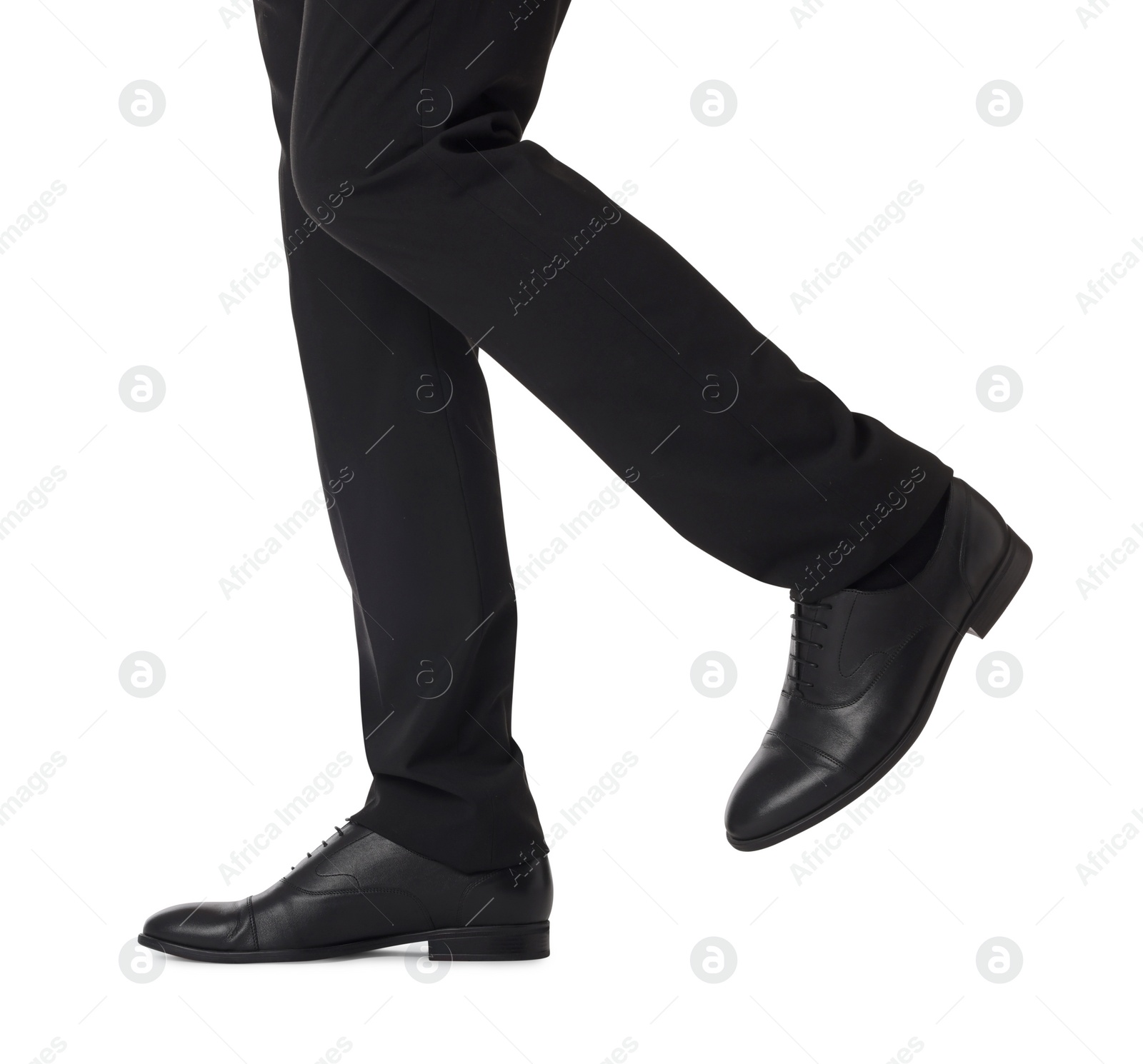 Photo of Businessman in leather shoes on white background, closeup