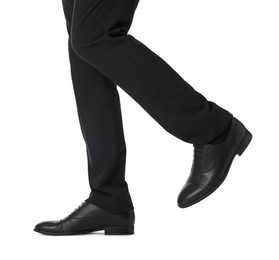 Photo of Businessman in leather shoes on white background, closeup