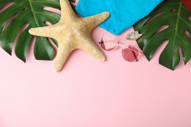 Photo of Flat lay composition with different beach objects on color background, space for text