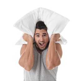 Photo of Young man with soft pillow on white background