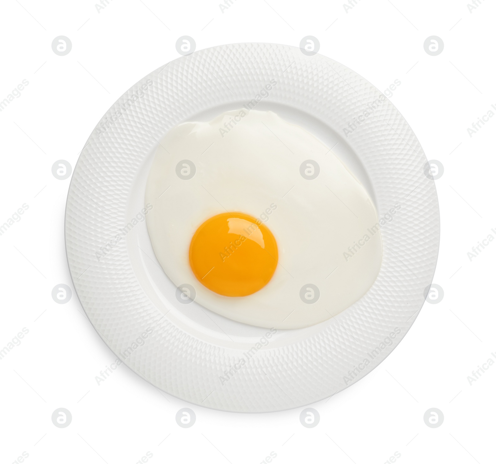 Photo of Plate with tasty fried egg isolated on white, top view