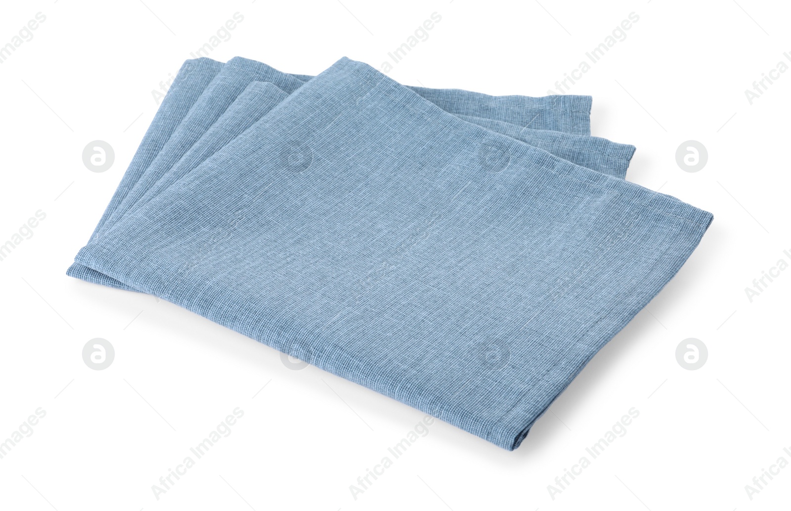 Photo of New clean light blue cloth napkins isolated on white