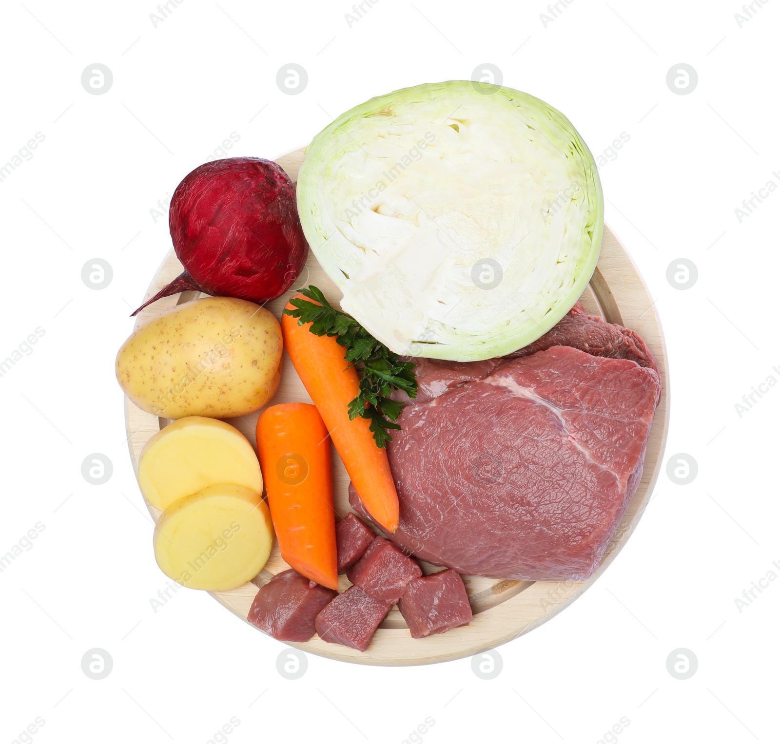 Photo of Ingredients for traditional borscht on white background, top view