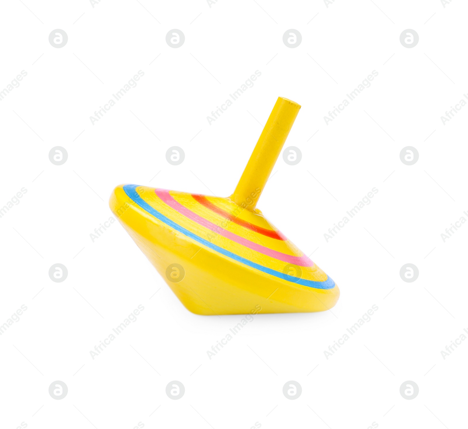 Photo of One bright spinning top isolated on white. Toy whirligig