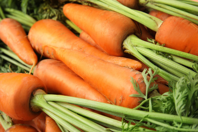 Photo of Fresh ripe carrots as background, closeup view