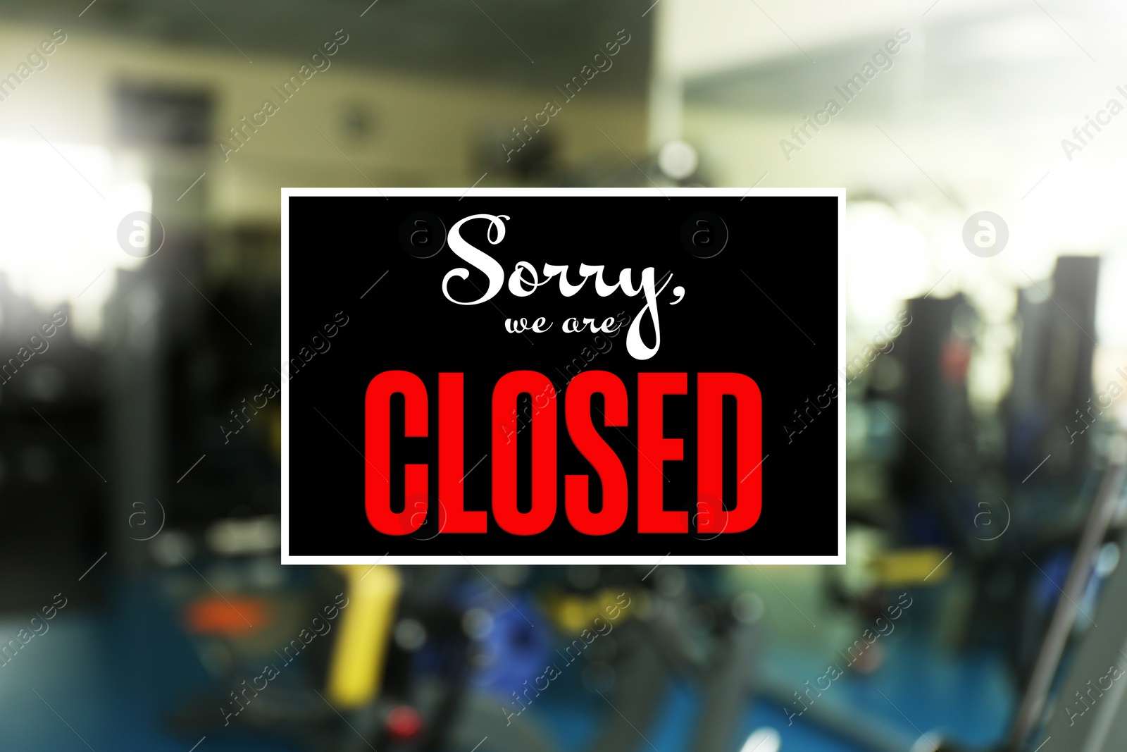 Image of Sorry we are closed sign against blurred background