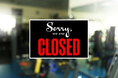 Image of Sorry we are closed sign against blurred background