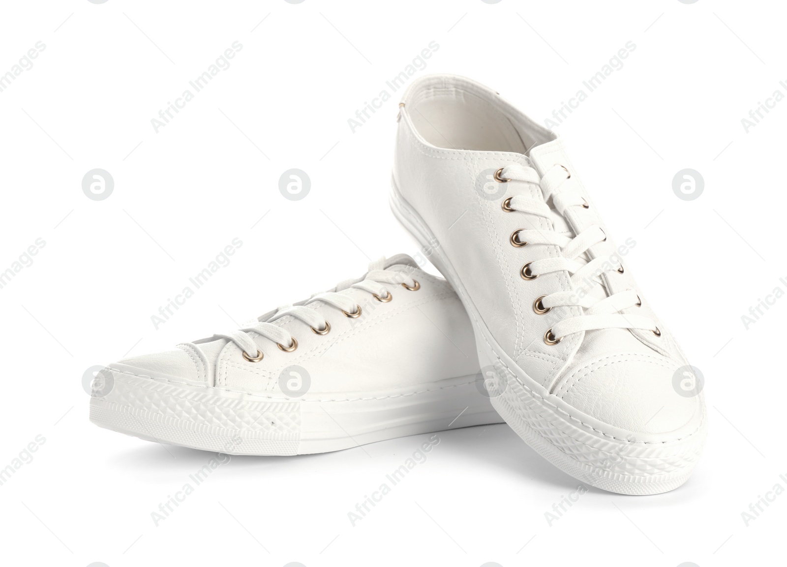 Photo of Pair of stylish sneakers on white background