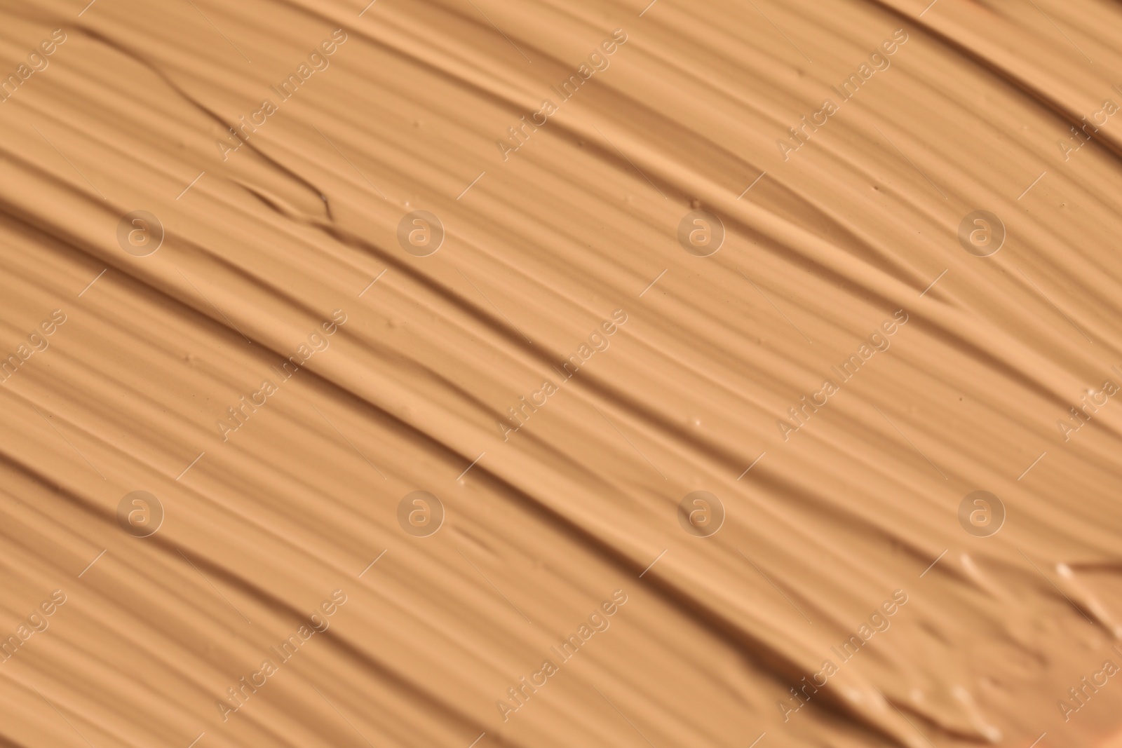 Photo of Texture of liquid skin foundation as background, closeup