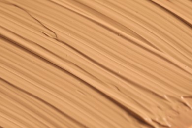 Photo of Texture of liquid skin foundation as background, closeup