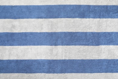 Photo of Striped beach towel as background, top view